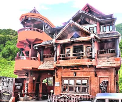 https://imgcld.yatra.com/ytimages/image/upload/t_hotel_yatra_city_desktop/v1434517555/Domestic Hotels/Hotels_Thekkady/Coffee Inn/OVERVIEW.jpg